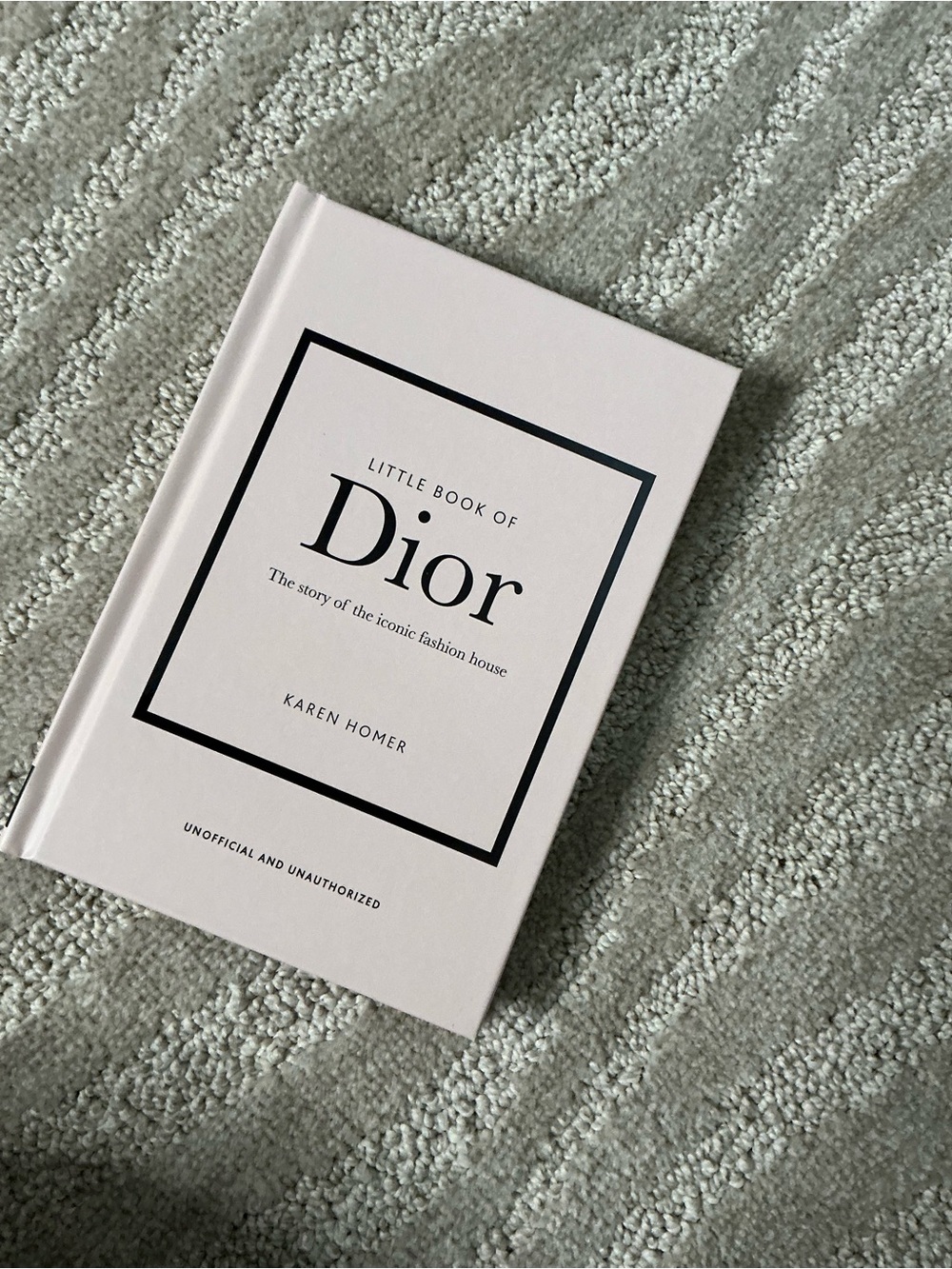 The Story of Dior Hardcover table book